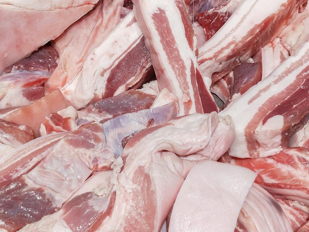 Pork belly cut into pieces for sale in the supermarket