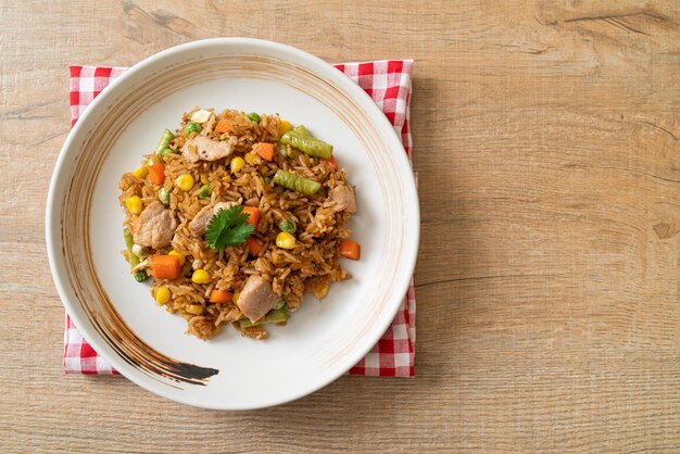 Pork fried rice on white plate