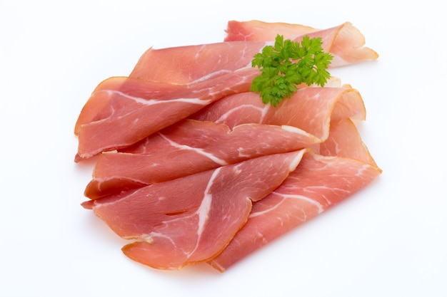 Pork ham slices isolated on white.