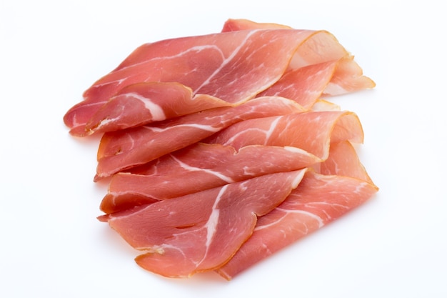 Pork ham slices isolated on white.