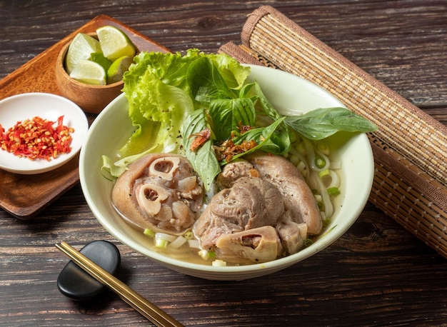 Pork Knuckle Pho served in bowl isolated on table top view of taiwan food