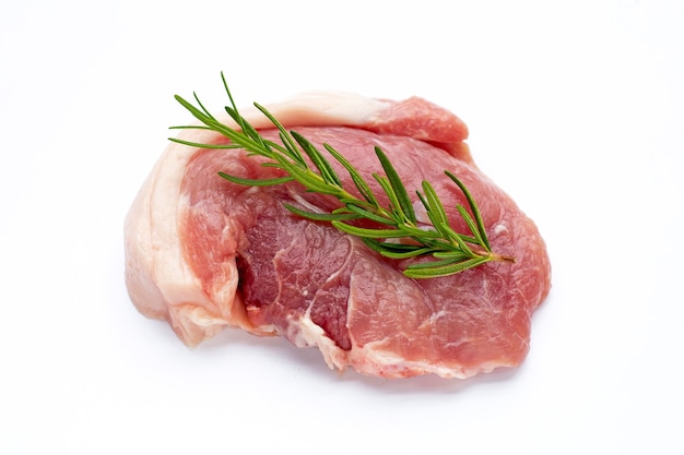 Pork meat with rosemary on white background.