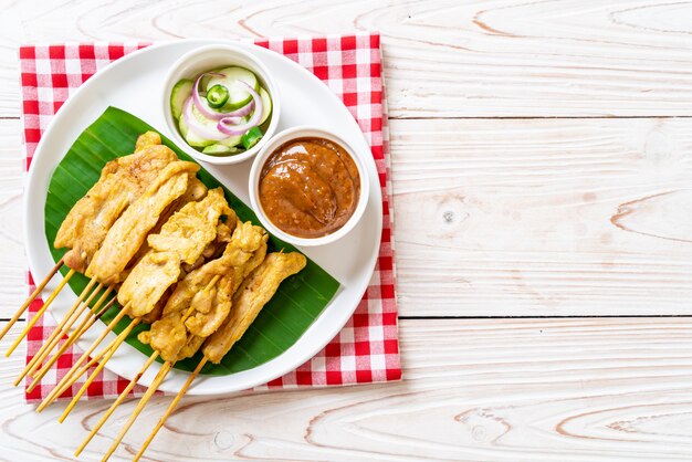 Pork satay, Grilled pork served with peanut sauce or sweet and sour sauce