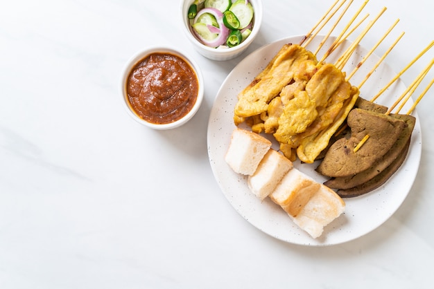 Pork Satay with Peanut Sauce and pickles