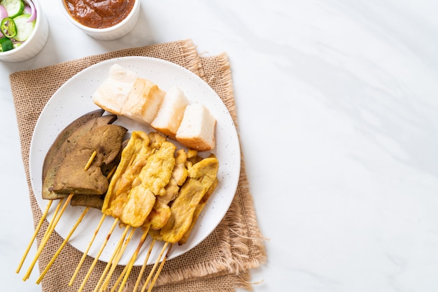 Pork Satay with Peanut Sauce and pickles