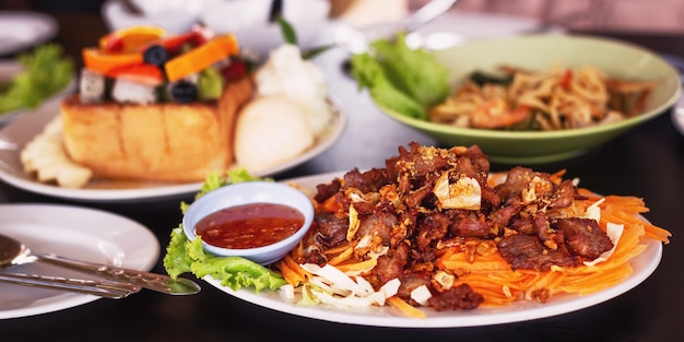 Pork sliced fried with garlic that looks beautiful and looks delicious.