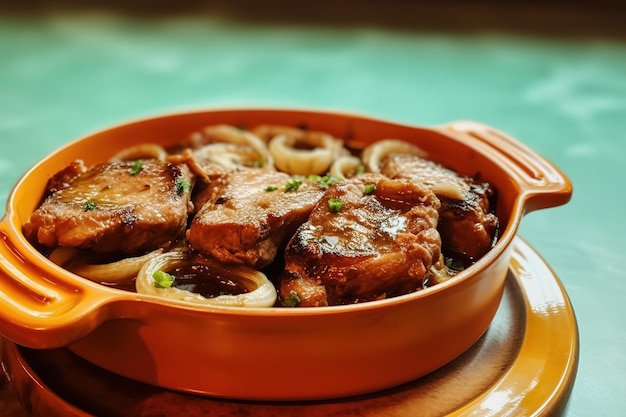 Pork Steak stacked in a casserole