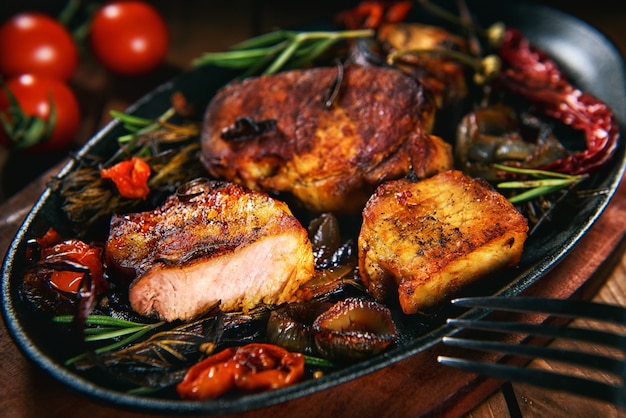 Pork steak with rosemary and tomatoes