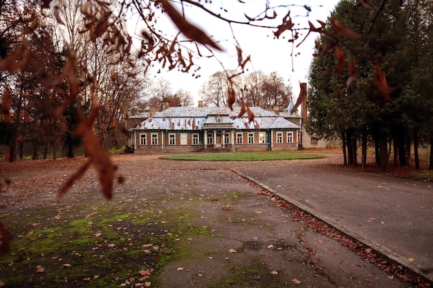 Porozovo village svislochsky district Grodno region Belarus Bogudenki manor November 2020 evening wooden buildinga monument of wooden architectural architecture illustrative edition