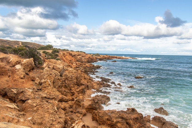 Port aux Princes, Tunisia, Cliffs and Rocks, Mediterranean Sea landscape with beautiful blue sky.