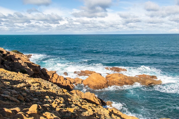 Port aux Princes, Tunisia, Cliffs and Rocks, Mediterranean Sea landscape with beautiful blue sky.