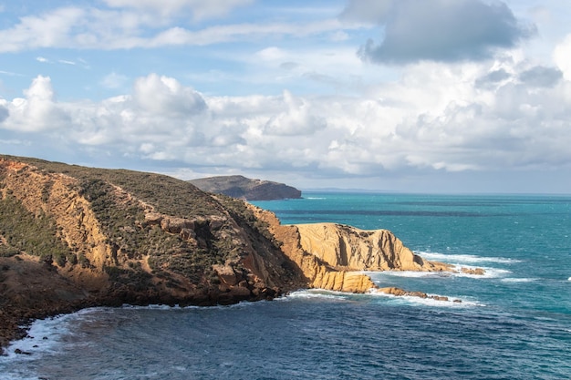 Port aux Princes, Tunisia, Cliffs and Rocks, Mediterranean Sea landscape with beautiful blue sky.