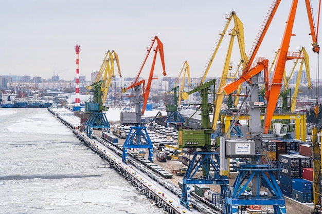 Port cranes of the unloading terminal. Saint-Petersburg. Russia. December 20, 2021