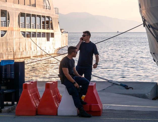 Port security at sunset  on Greek island of Evia in Greece