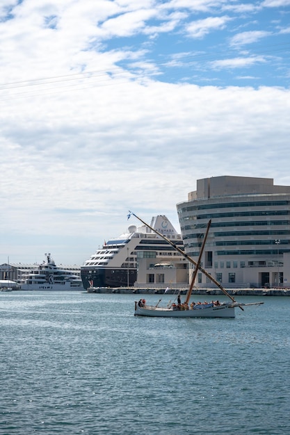 Port Vell building yacht and cruise liner in a harbor Barcelona Spain May 26 2022