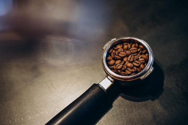 Portafilter holder full of coffee beans