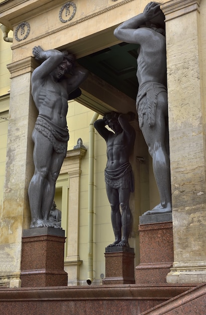 Portico Of The New Hermitage Stone figures of Atlanteans holding a cornice