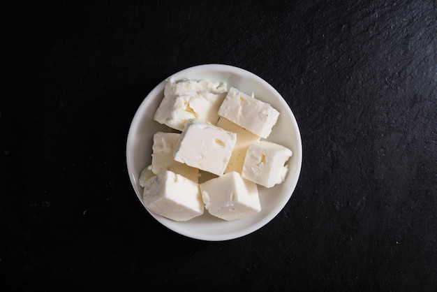 Portion of Feta Cheese on slate