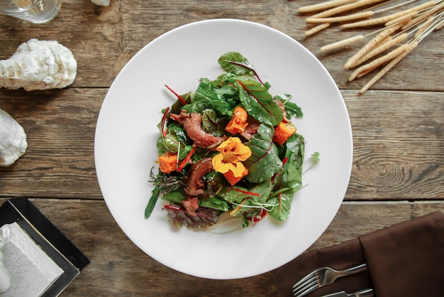 Portion of gourmet pumpkin salad