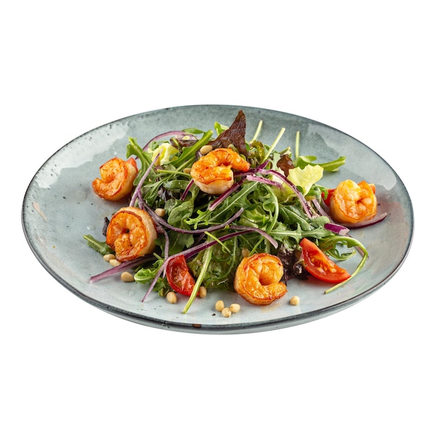 Portion of gourmet shrimp salad with arugula