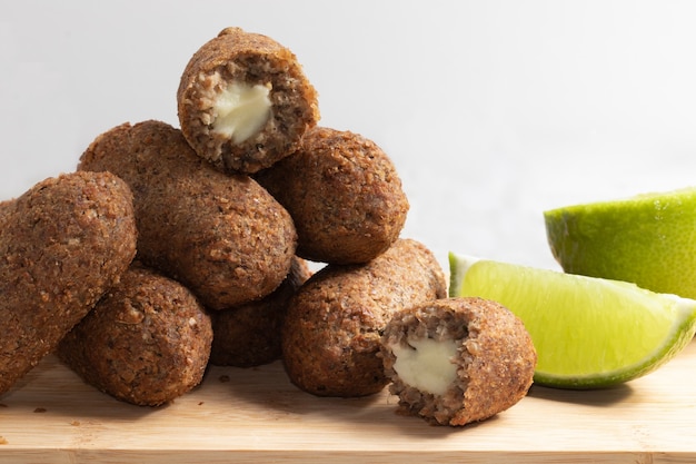 A portion of kibbeh stuffed with cheese .