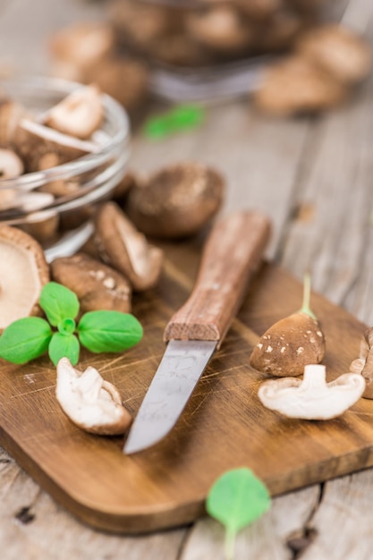 Portion of Raw Shiitake mushrooms selective focus