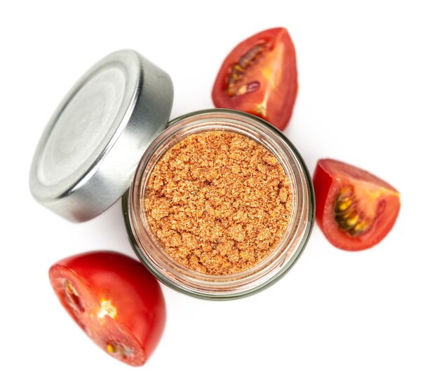 Portion of Tomato Powder isolated on white