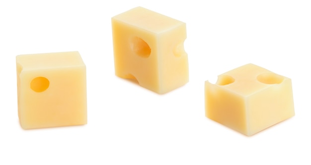 Portions (cubes, dice) of Emmental Swiss cheese. Texture of holes and alveoli. Isolated