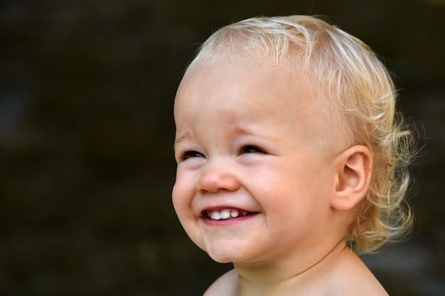 Portrait about a happy smiling little child