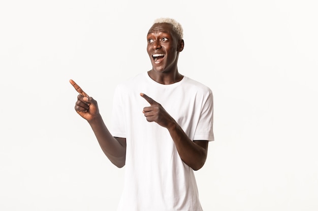 Portrait of African-American blond guy posing