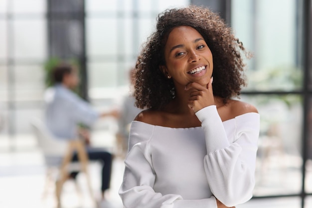 Portrait of an african american young business woman working in the office