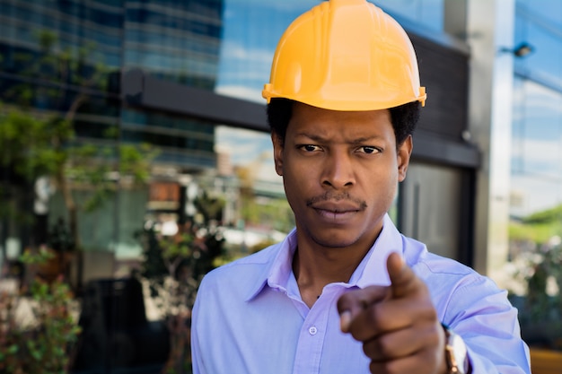 Portrait of Afro american architect in hard hat