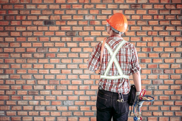 Portrait of an air conditioner expert technician In standard safety uniforms