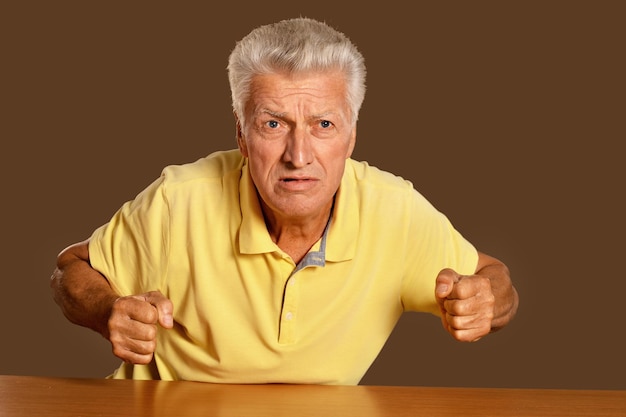 Portrait of angry senior man