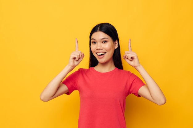 Portrait Asian beautiful young woman red tshirts posing modern style studio model unaltered