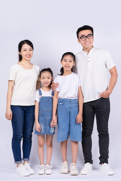 Portrait of Asian family on white background