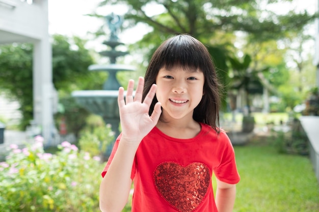 Portrait asian kid child enjoy and happy little girlxA