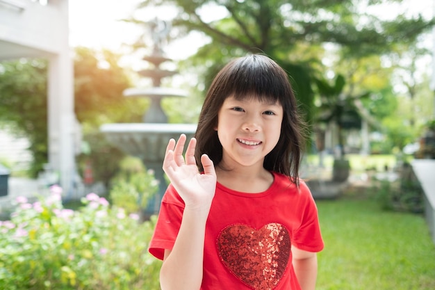 Portrait asian kid child enjoy and happy little girlxA