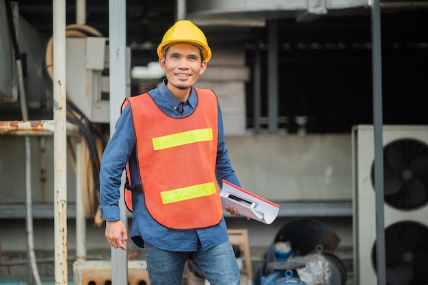 Portrait of Asian man engineer construction concept Asian man engineer in construction site Worker in building construction site worker helmet confident copy spec worker in safety suit at work