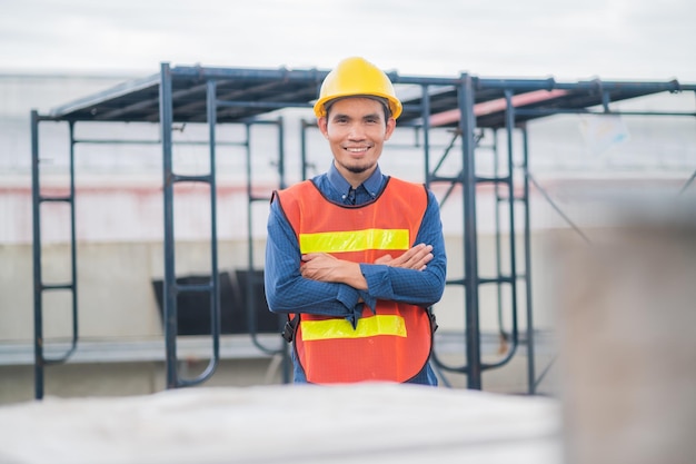 Portrait of Asian man engineer construction concept Asian man engineer in construction site Worker in building construction site worker helmet confident copy spec worker in safety suit at work