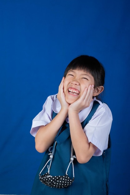 Portrait asian student happy little girl