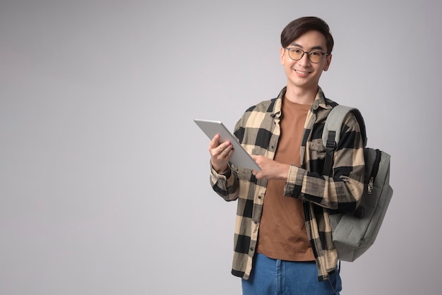 Portrait of an Asian university student over white background studio education conceptx9