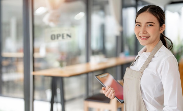 Portrait of asian woman barista cafe owner SME entrepreneur seller business concept