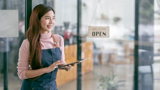 Portrait of asian woman barista cafe owner SME entrepreneur seller business concept