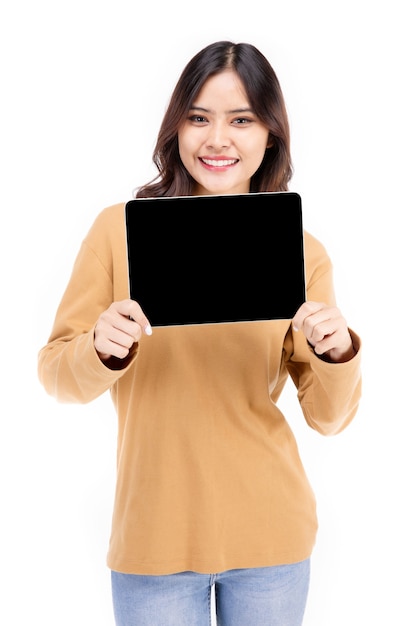 Portrait of Asian woman showing or presenting tablet computer on hand over white background, Beautiful woman looking healthy, confident isolated on white.