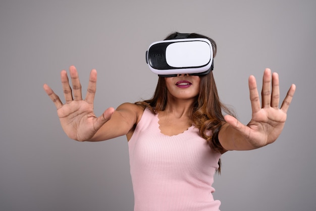 Portrait of Asian woman using virtual reality headset