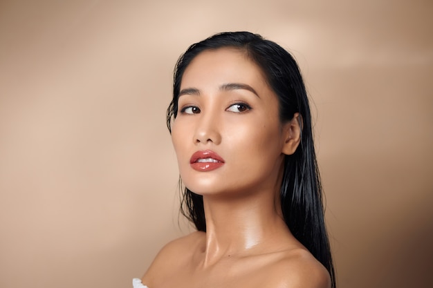 Portrait of Asian woman with flawless skin