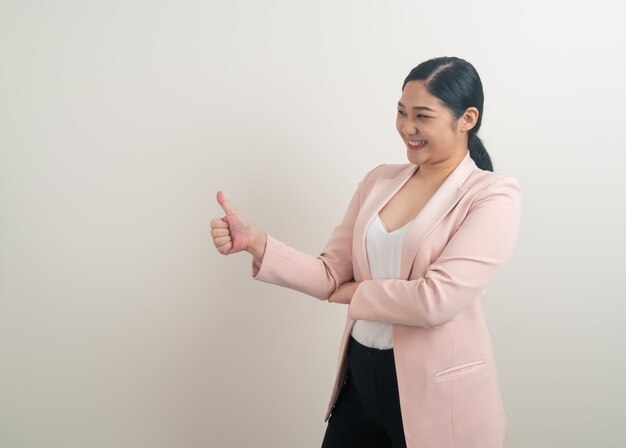 portrait Asian woman with thumb up white background