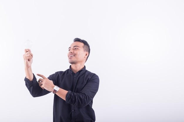 Portrait of asians Happy handsome young man Dress-up in black t-shirt 