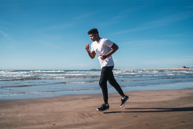 Portrait of an athletic man running